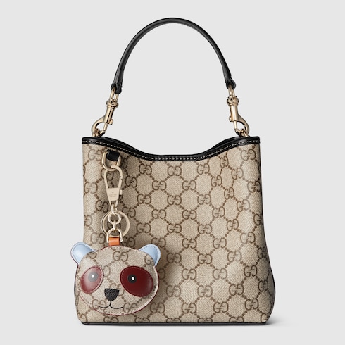 GG Emblem small bucket bag beige and dark