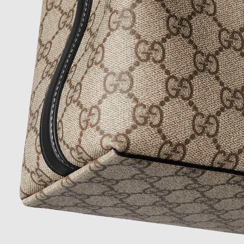 GG Emblem small bucket bag beige and dark